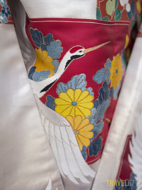 _6455527 blog Hopefully I will get to see some real Red-crowned Cranes (Grus japonensis) this winter. I spotted this one on the back of a bridal kimono. The Red-crowned Crane is thought to bring luck, longevity and fidelity which is why it's often found on wedding kimono.